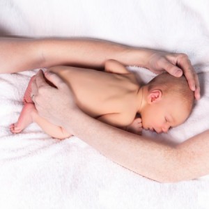 Forensic Pathology Expert Witness Advises on Vertebrae Injuries Occurring During Newborn Delivery