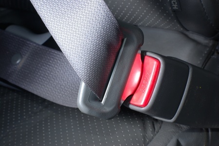 Defective Seat Belt Unlatched During Automotive Rollover Accident